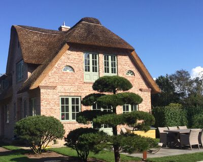 Reetdachhaus Narwal & Schwertwal